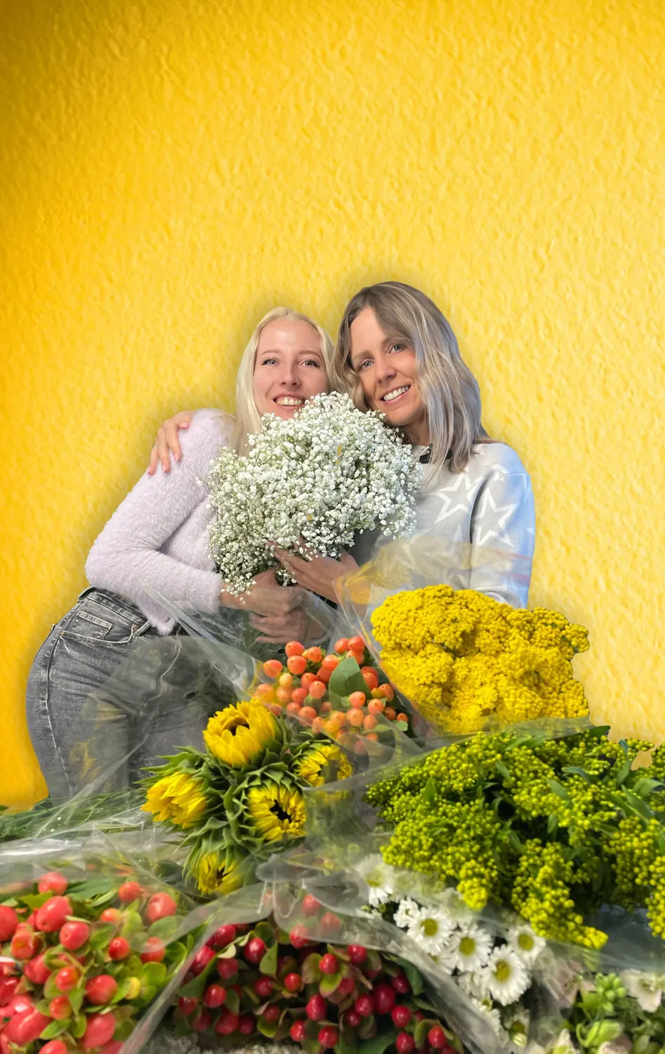 The Ecualand team among bunches of Ecuadorian flowers